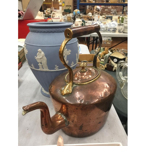 84 - A VINTAGE BRASS AND COPPER KETTLE