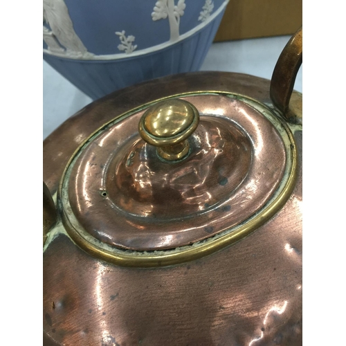 84 - A VINTAGE BRASS AND COPPER KETTLE