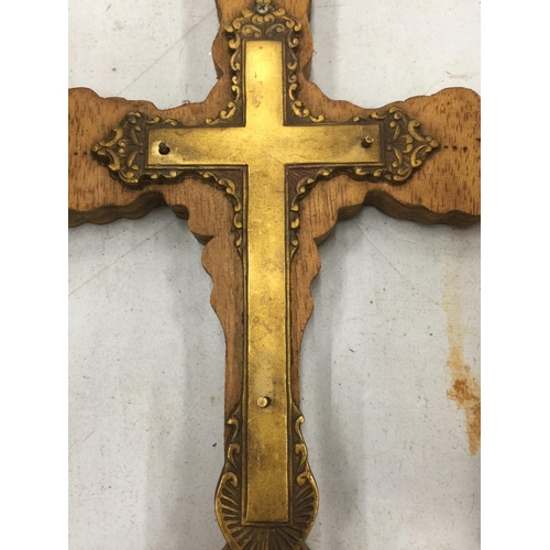 85 - A WOOD AND BRASS CRUCIFIX