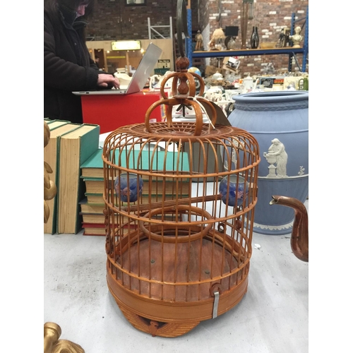 87 - A VINTAGE CHINESE STYLE BIRD CAGE