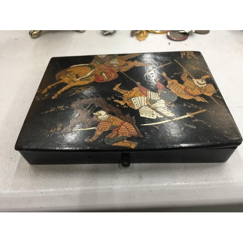 99 - AN ORIENTAL STYLE LACQUERED BOX 14CM X 10CM