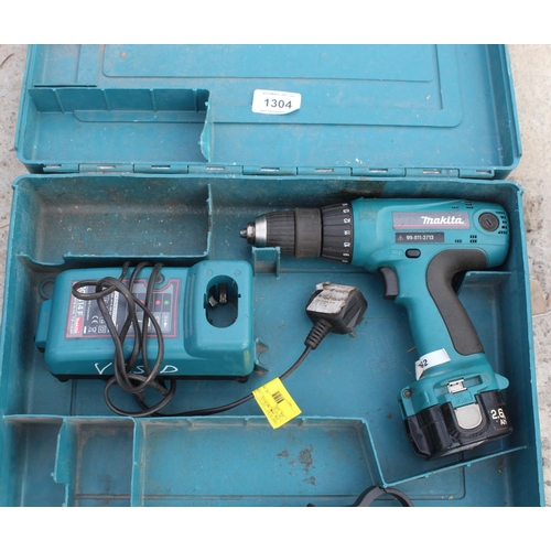 1304 - MAKITA DRILL AND CHARGER  WORKING ORDER+ VAT