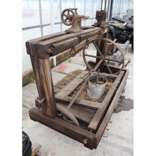 132 - A VINTAGE LATHE WITH WOODEN STAND AND FRAME +VAT