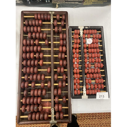 213 - TWO JAPANESE ABACUS WITH INSTRUCTIONS AND A BOOKLET