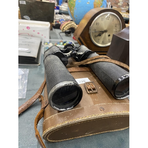 220 - A PAIR OF VINTAGE LIEBERMAN AND GORTZ BINOCULARS IN A CASE