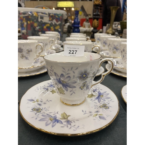 227 - TWELVE COLCLOUGH RAPSODY IN BLUE TRIOS, TWO SPARE CUPS AND PLATES