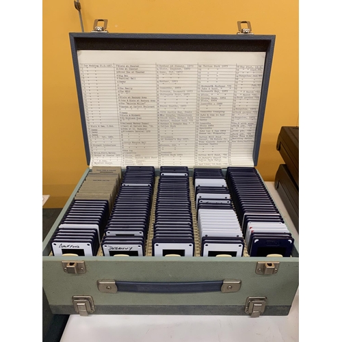 258 - A PATERSON SLIDE VIEWER PLUS A BOX CONTAINING A QUANTITY OF SLIDES