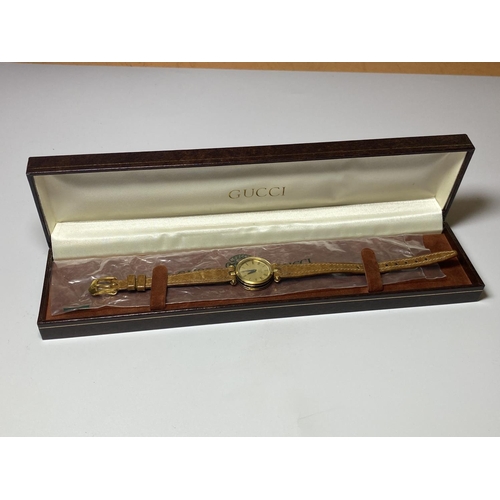 512 - A BOXED LADIES 'GUCCI' QUARTZ WATCH