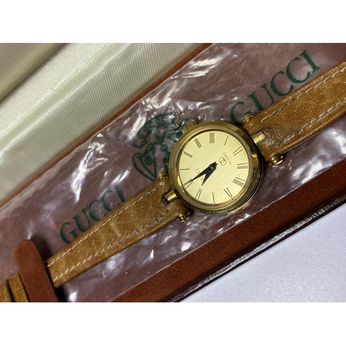 512 - A BOXED LADIES 'GUCCI' QUARTZ WATCH