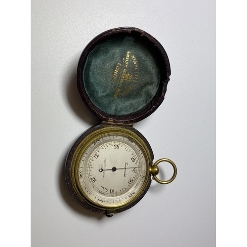 519 - AN EARLY 20TH CENTURY COMPENSATED POCKET BAROMETER BY NEGRETTI & ZAMBRA, LONDON WITH ORIGINAL LEATHE... 