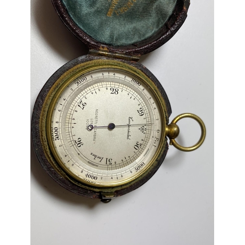 519 - AN EARLY 20TH CENTURY COMPENSATED POCKET BAROMETER BY NEGRETTI & ZAMBRA, LONDON WITH ORIGINAL LEATHE... 