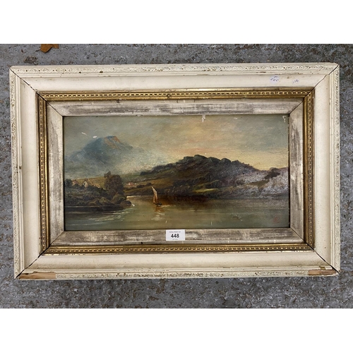 448 - A VICTORIAN OIL ON BOARD DEPICTING A SAILING BOAT IN HIGHLAND LAKE SCENE