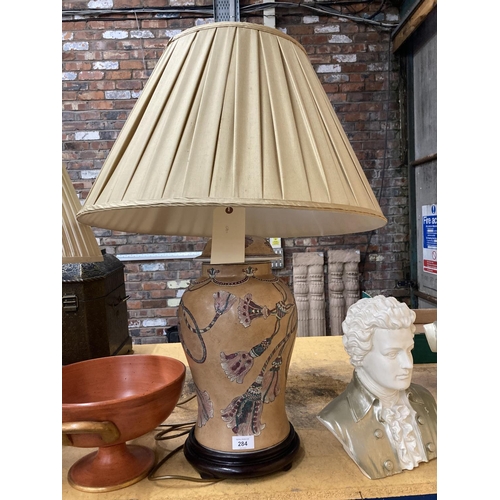 284 - A LARGE ORIENTAL STYLE TABLE LAMP WITH SHADE AND EMBOSSED SWAG DECORATION HEIGHT TO BULB FITTING 51C... 