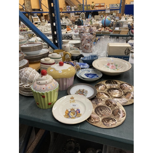 303 - A QUANTITY OF CERAMIC ITEMS TO INCLUDE CUP CAKE STORAGE JARS, CHINA CUPS AND SAUCERS, WADE PORT BARR... 