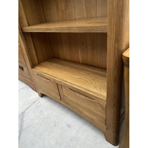 A MODERN 'J.B.GLOBAL' OAK FOUR TIER OPEN BOOKCASE WITH CUPBOARDS TO THE