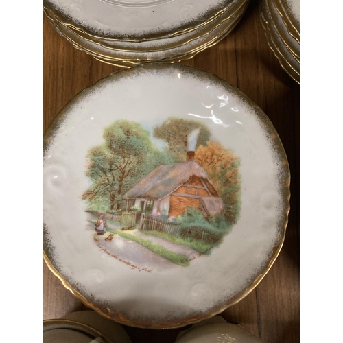 934 - A BAVARIAN TEASET DEPICTING A COTTAGE SCENE EDGED IN BRUSHED GOLD