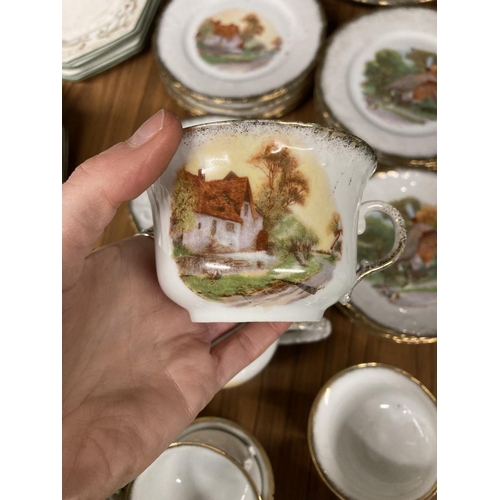 934 - A BAVARIAN TEASET DEPICTING A COTTAGE SCENE EDGED IN BRUSHED GOLD