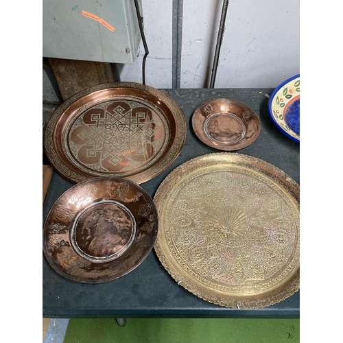 940 - TWO LARGE COPPER TRAYS AND TWO COPPER BOWLS