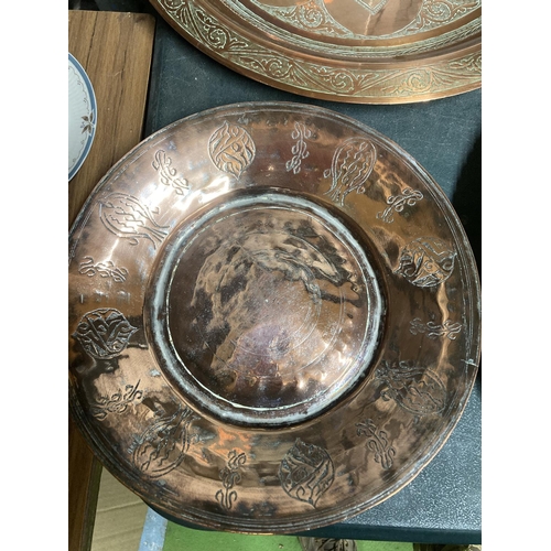 940 - TWO LARGE COPPER TRAYS AND TWO COPPER BOWLS