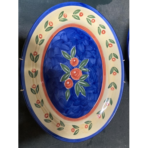 941 - TWO LARGE HANDPAINTED PORTUGUESE PLATTERS PLUS A HANDPAINTED CHARGER