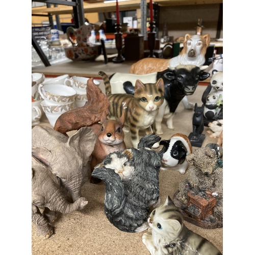 947 - A LARGE QUANTITY OF COLLECTABLES MAINLY ANIMALS TO INCLUDE ELEPHANTS, PIGS, CATS, DOGS ETC