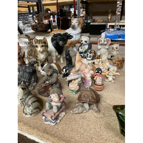 947 - A LARGE QUANTITY OF COLLECTABLES MAINLY ANIMALS TO INCLUDE ELEPHANTS, PIGS, CATS, DOGS ETC