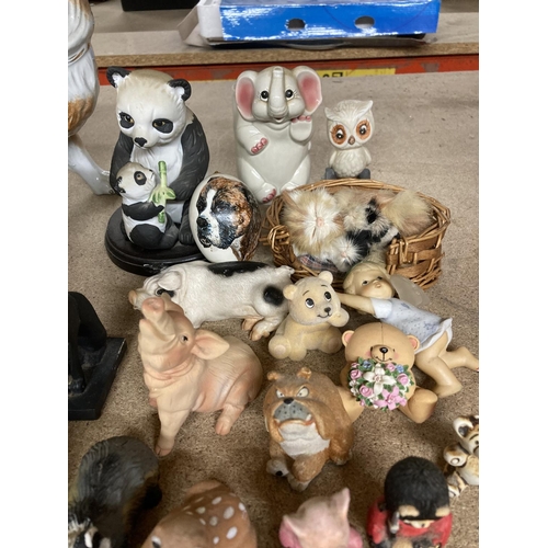 947 - A LARGE QUANTITY OF COLLECTABLES MAINLY ANIMALS TO INCLUDE ELEPHANTS, PIGS, CATS, DOGS ETC