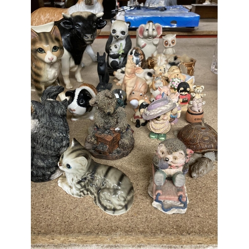 947 - A LARGE QUANTITY OF COLLECTABLES MAINLY ANIMALS TO INCLUDE ELEPHANTS, PIGS, CATS, DOGS ETC