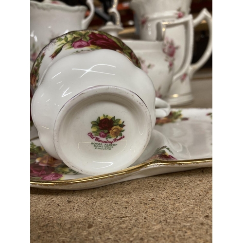 949 - A ROYAL ALBERT COLEEN COFFEEPOT TOGETHER WITH A FURTHER BOATSHAPED CABBAGE ROSE TEAPOT AND HOT WATER... 