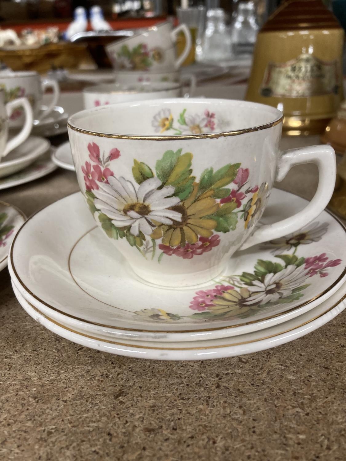A QUANTITY OF KIRKLANDS EMBASSY WARE ETRURIA CUPS, SAUCERS AND SIDE PLATES