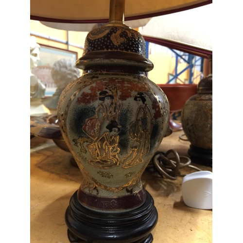 317 - TWO ORIENTAL STYLE TABLE LAMPS WITH CLOISONNE STYLE DECORATION OF ORIENTAL FIGURES, WITH SHADES HEIG... 