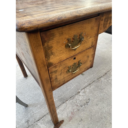 2672 - A MID 20TH CENTURY OAK TWIN-PEDESTAL OFFICE DESK