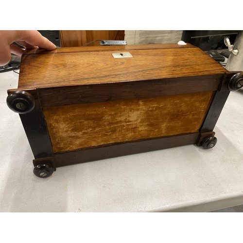 5A - A 19TH CENTURY ROSEWOOD SARCOPHAGUS SHAPED TEA CADDY WITH THREE INNER COMPARTMENTS, 22 X 35 X 17CM