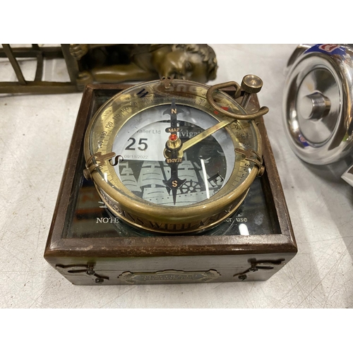 25 - A COLLECTABLE BRASS SHIPS COMPASS IN WOODEN BOX