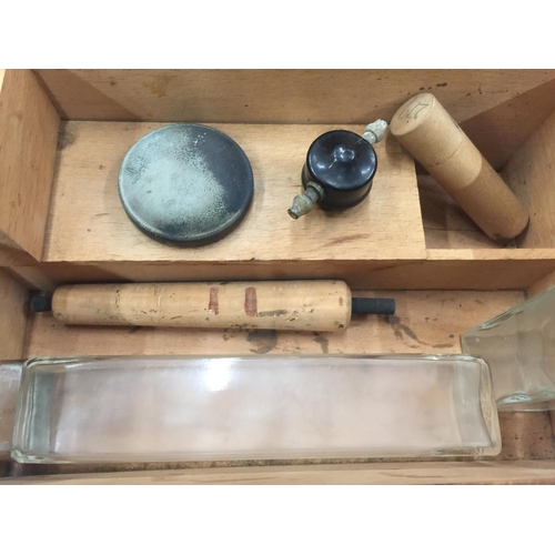 89 - A WOODEN BOX AND CONTENTS TO INCLUDE TWO SILVER PLATED TOP BOTTLES