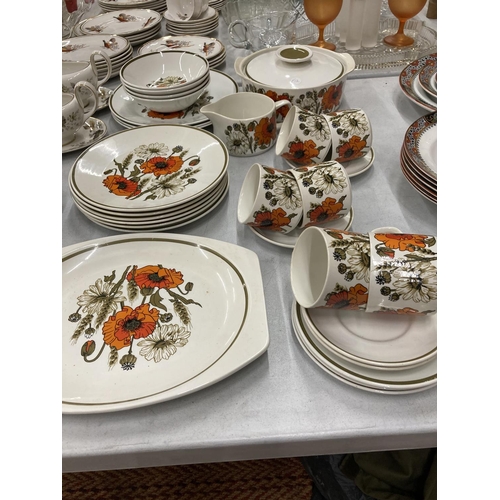 210 - A QUANTITY OF J & G MEAKIN POPPY DINNERWARE (SOME SECONDS) TO INCLUDE PLATES, LIDDED DISH, CUPS AND ... 