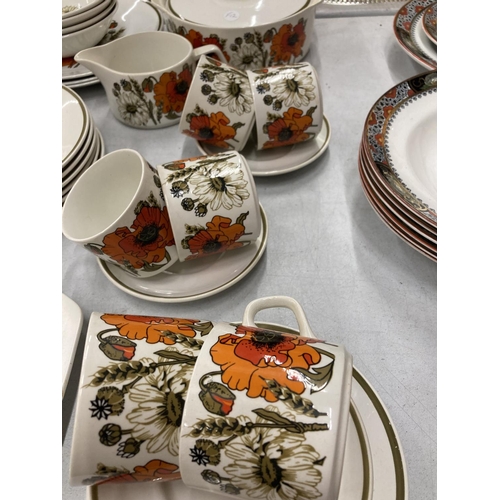 210 - A QUANTITY OF J & G MEAKIN POPPY DINNERWARE (SOME SECONDS) TO INCLUDE PLATES, LIDDED DISH, CUPS AND ... 