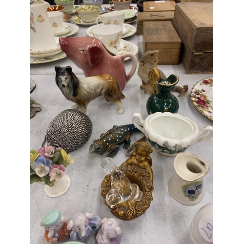 245 - A QUANTITY OF CERAMICS TO INCLUDE ANIMALS, MINI VASES, CONDIMENTS, ETC