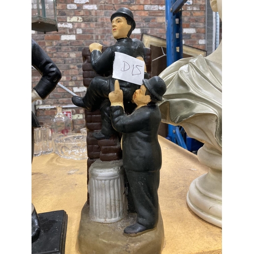 289 - A RESIN FIGURE OF CHARLIE CHAPLIN PLUS A FIGURE GROUP OF LAUREL AND HARDY HEIGHT 43CM