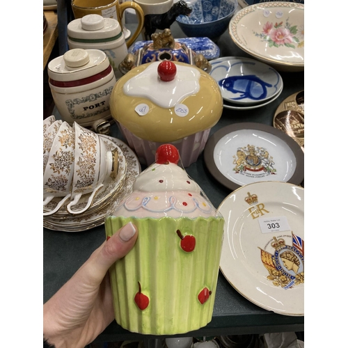 303 - A QUANTITY OF CERAMIC ITEMS TO INCLUDE CUP CAKE STORAGE JARS, CHINA CUPS AND SAUCERS, WADE PORT BARR... 