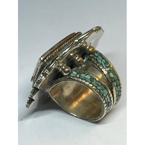 528 - A LARGE SILVER NAVAJO STYLE RING