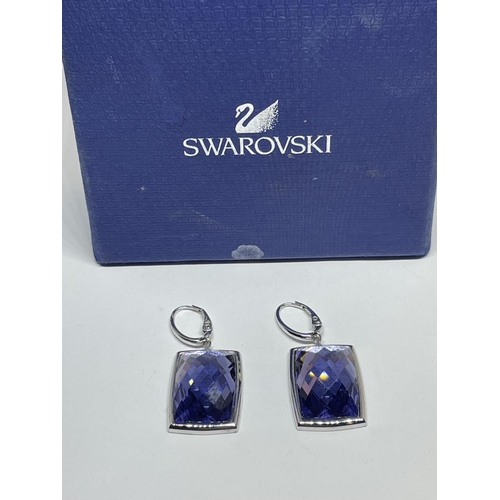 579 - A PAIR OF SWAROVSKI CRYSTAL EARRINGS IN A PRESENTATION BOX