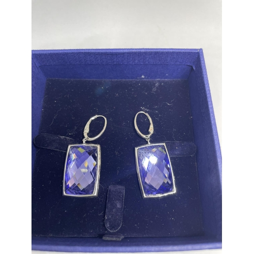 579 - A PAIR OF SWAROVSKI CRYSTAL EARRINGS IN A PRESENTATION BOX