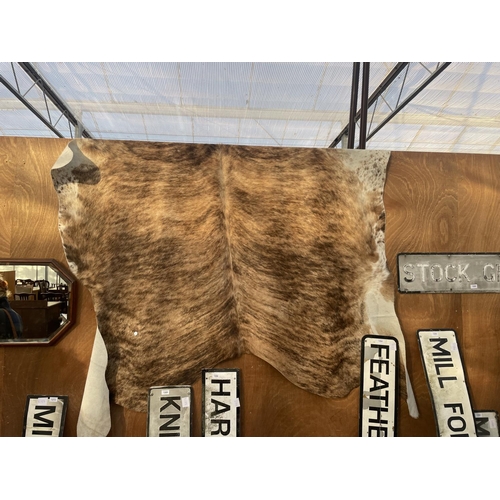 2195 - A LARGE ANIMAL HIDE RUG