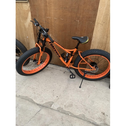 1204 - AN AS NEW ORANGE FOREKNOW SNOW BIKE WITH FRONT AND REAR SUSPENSION AND 24 SPEED SHIMANO GEAR SYSTEM