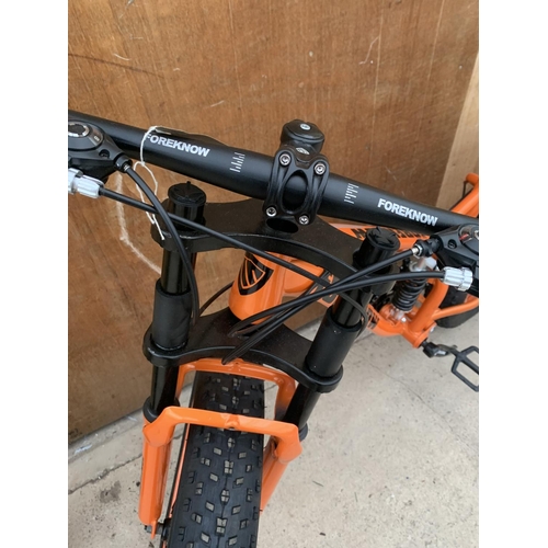 1204 - AN AS NEW ORANGE FOREKNOW SNOW BIKE WITH FRONT AND REAR SUSPENSION AND 24 SPEED SHIMANO GEAR SYSTEM