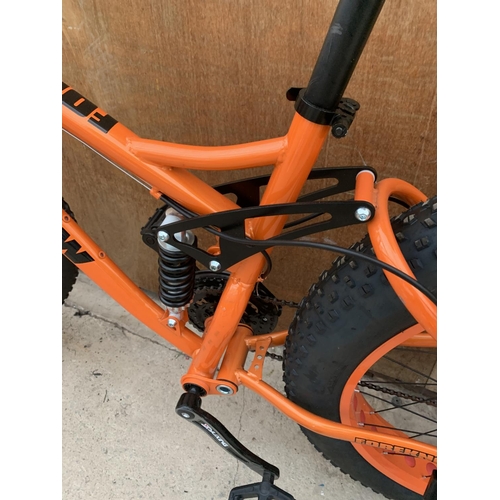 1204 - AN AS NEW ORANGE FOREKNOW SNOW BIKE WITH FRONT AND REAR SUSPENSION AND 24 SPEED SHIMANO GEAR SYSTEM