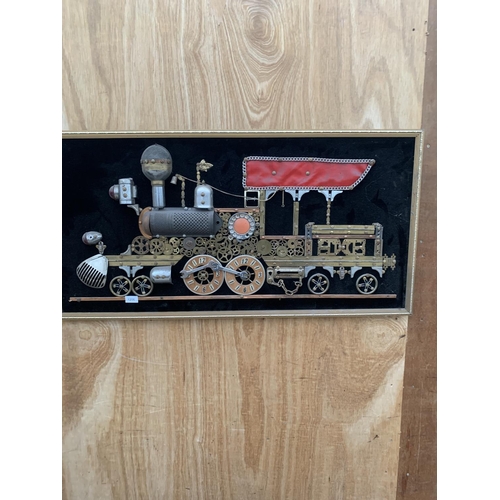 1206 - A GILT FRAMED SCRATCH BUILT IMAGE OF A TRAIN USING VARIOUS VINTAGE ITEMS