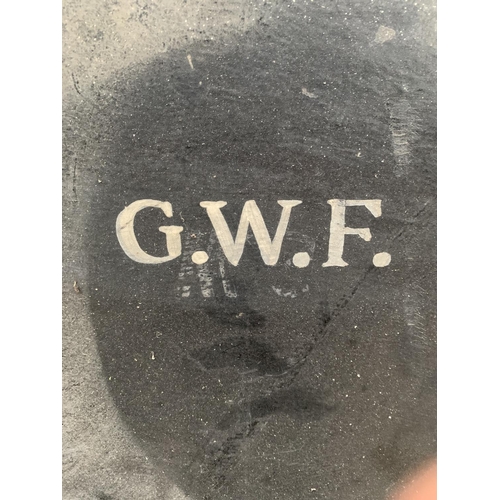 1209 - A LARGE VINTAGE HAT BOX BEARING THE INITIALS 'G.W.F'