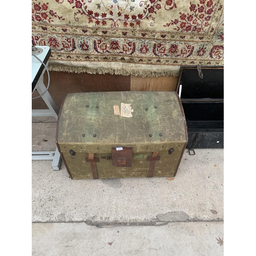 1211 - A VINTAGE DOME TOPPED TRAVEL TRUNK WITH LEATHER STRAPS AND CARRYING HANDLES